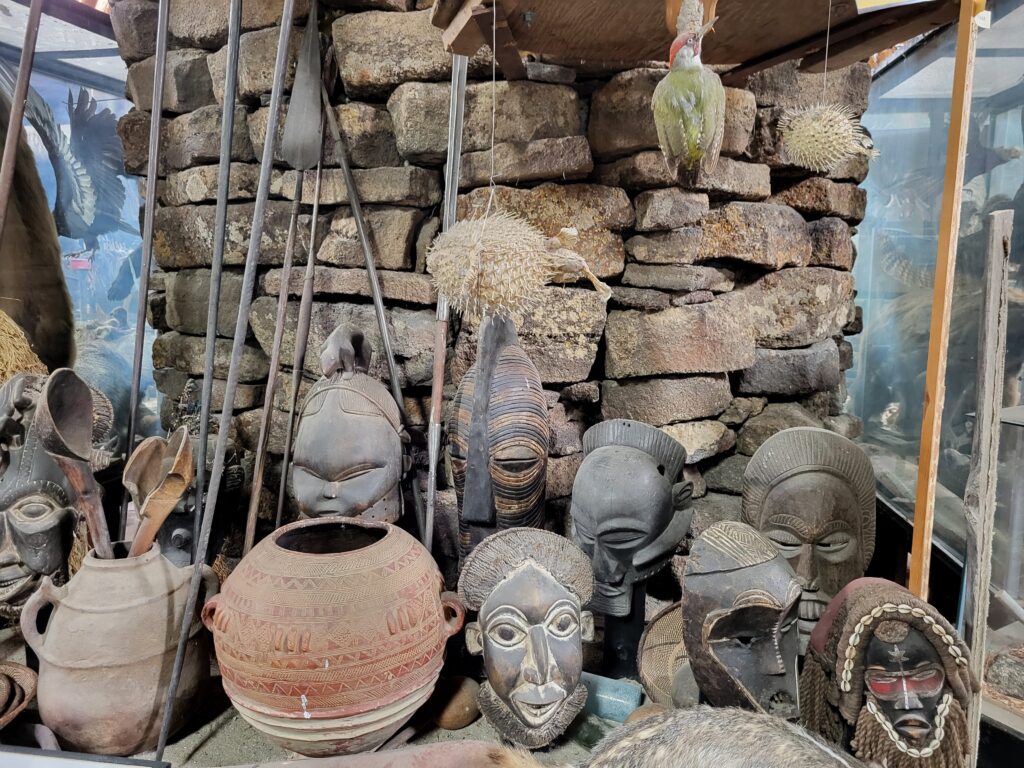 African masks, pottery, a pufferfish, and woodpecker at Idaho's Mammoth Cave and Shoshone Bird Museum